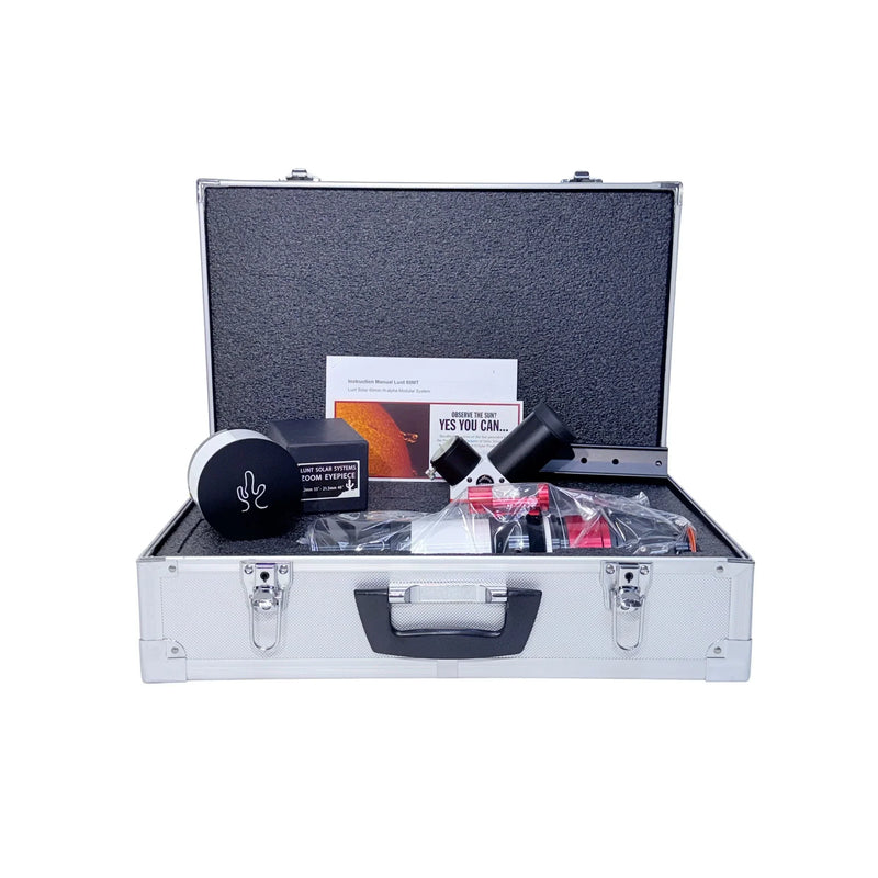 Astronomy telescope kit with eyepieces, accessories, and instruction manual in carrying case